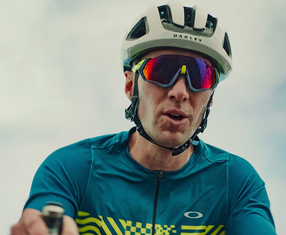 Cyclist wearing Oakely sunglasses